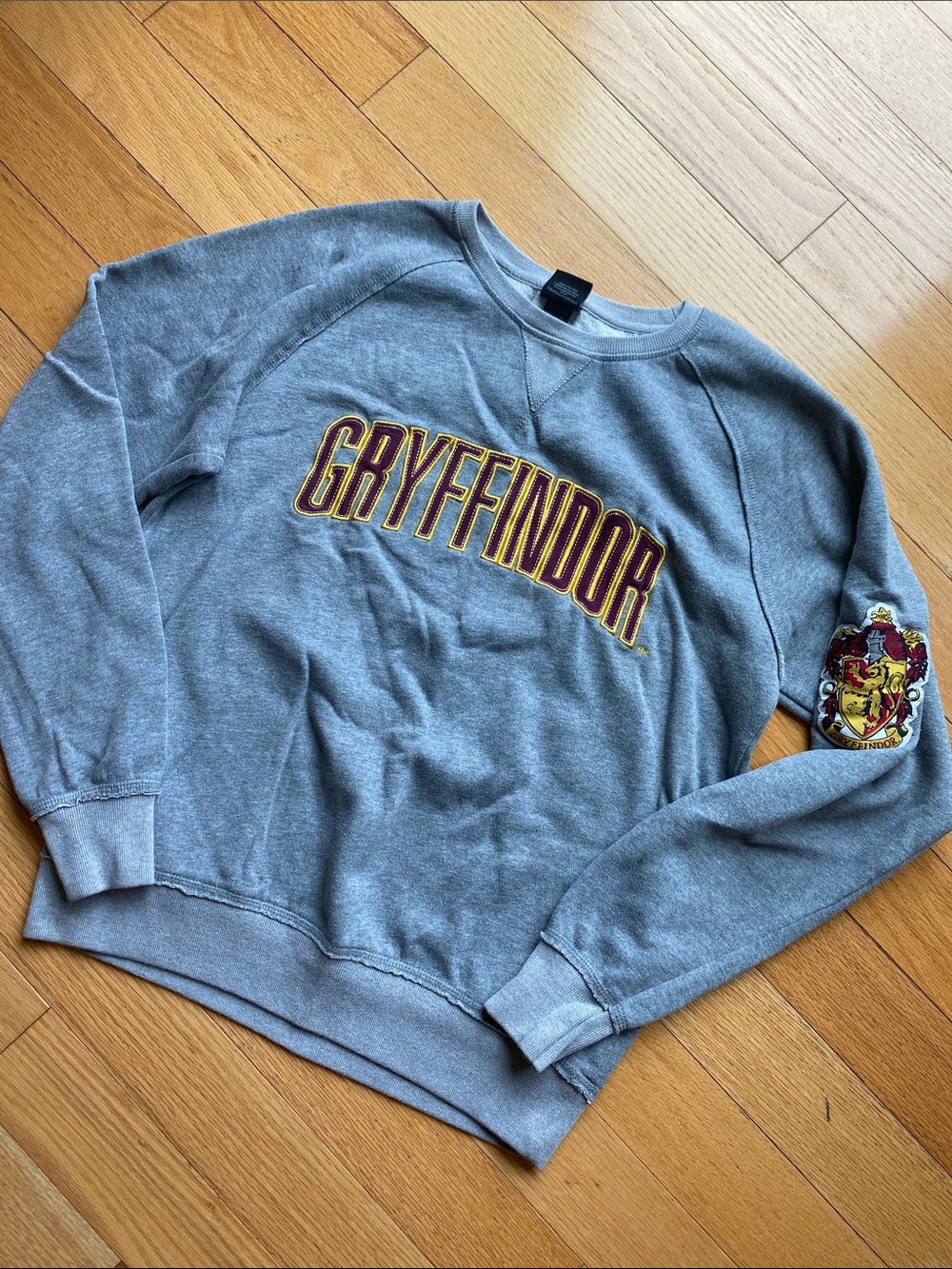 Gryffindor Gray Crewneck Sweatshirt with Crest Sleeve Patch